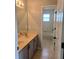 Bathroom with double sinks and a bathtub at 511 Elbridge Pl, Kissimmee, FL 34758