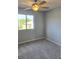 Bedroom featuring a ceiling fan and a window for natural light at 511 Elbridge Pl, Kissimmee, FL 34758