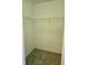 Empty walk-in closet with carpet floors and wire shelving at 511 Elbridge Pl, Kissimmee, FL 34758