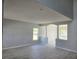 Open living area with neutral walls, modern flooring, and plenty of natural light at 511 Elbridge Pl, Kissimmee, FL 34758