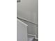 View of carpeted staircase with white railing at 511 Elbridge Pl, Kissimmee, FL 34758