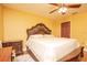 Bedroom showcasing decorative furniture with a large bed and neutral colors at 5572 Myakka Ave, Intercession City, FL 33848