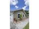 Charming single-story home featuring a well-maintained exterior and a convenient attached garage at 5572 Myakka Ave, Intercession City, FL 33848