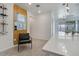 Bright dining area featuring a modern wine rack, stylish seating, and ample natural light at 6494 Rover Way, St Cloud, FL 34771