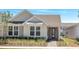 Charming single-story home with neutral paint, tidy landscaping, and a welcoming front entrance at 6494 Rover Way, St Cloud, FL 34771