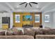 Cozy living room with large TV, modern furniture, and a relaxed atmosphere at 6494 Rover Way, St Cloud, FL 34771