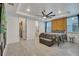 Bedroom featuring a bed with a wood slat accent wall and a doorway to a closet at 6494 Rover Way, St Cloud, FL 34771