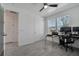 Office room with a ceiling fan, windows for natural light and neutral paint at 6494 Rover Way, St Cloud, FL 34771