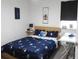 Bedroom with a desk and space-themed decor at 6617 Harper Way, Harmony, FL 34773