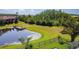 Enjoy the peaceful pond views in this community with lush landscaping, mature trees, and well-maintained lawns at 772 San Raphael St, Kissimmee, FL 34759