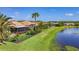 Enjoy the fenced backyard, screened lanai, and water view of this charming single-story home at 772 San Raphael St, Kissimmee, FL 34759