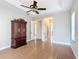 Spacious main bedroom with laminate flooring, tray ceiling and open entrance to ensuite at 772 San Raphael St, Kissimmee, FL 34759