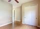 Bright bedroom with laminate floors, closet and neutral paint throughout at 772 San Raphael St, Kissimmee, FL 34759