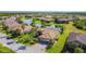 Stunning home with a tile roof, lush landscaping, and a picturesque water view in a desirable neighborhood at 772 San Raphael St, Kissimmee, FL 34759