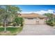 Attractive home with a brick paver driveway and a spacious three-car garage, enhancing curb appeal at 772 San Raphael St, Kissimmee, FL 34759