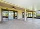 Spacious screened patio featuring ceiling fans and ample room for entertaining at 772 San Raphael St, Kissimmee, FL 34759