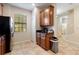 Functional kitchen with ample cabinet space, granite countertops, and a breakfast nook at 9163 Wedge Dr, Davenport, FL 33896