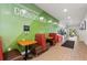 Comfortable waiting area with booth seating and community information at the clubhouse at 9163 Wedge Dr, Davenport, FL 33896