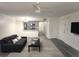 Cozy living room with sleek furniture and open layout connected to a modern kitchen at 2721 N Poinciana Blvd # 163, Kissimmee, FL 34746