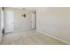 Carpeted bedroom featuring closet and neutral walls at 1038 Sabine Pl, Kissimmee, FL 34759