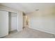 Bedroom with closet and access to hallway, offering convenient storage and access at 1038 Sabine Pl, Kissimmee, FL 34759