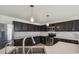 Stylish kitchen with stainless steel appliances, white countertops, and subway tile backsplash at 1038 Sabine Pl, Kissimmee, FL 34759