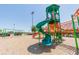 Modern playground featuring a green slide and climber in a recreational community park at 1038 Sabine Pl, Kissimmee, FL 34759