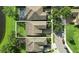 An aerial view showcasing the house's roof and yard, highlighting the property's location and surrounding community at 12867 Woodmere Close Dr, Windermere, FL 34786
