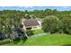 Aerial view of a single-Gathering home with a spacious backyard, screened pool and fenced perimeter at 12867 Woodmere Close Dr, Windermere, FL 34786