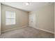 Bedroom with plush carpet and double door closet at 12867 Woodmere Close Dr, Windermere, FL 34786