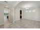 Elegant dining room featuring tile floors, a chandelier, and natural light at 12867 Woodmere Close Dr, Windermere, FL 34786