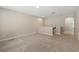 Neutral carpeted upstairs hallway with access to other rooms in the house at 12867 Woodmere Close Dr, Windermere, FL 34786