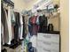 Walk in closet with shelving and ample storage space at 13427 Fairway Glen Dr # 103, Orlando, FL 32824