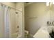 Bathroom with tub/shower combination and sink with white countertops at 15079 Guava Bay Dr, Winter Garden, FL 34787