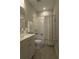 Bathroom featuring a tub/shower combination and a single sink vanity at 15079 Guava Bay Dr, Winter Garden, FL 34787