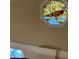 Unique stained glass window above a picture window adds character to the home at 1835 Harbor Blvd, Kissimmee, FL 34744