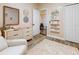 Charming Bedroom with decorations, a crib, and a changing table at 1933 Estancia Cir, Kissimmee, FL 34741