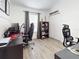 Bedroom featuring a closet with shelving, a desk and lots of natural light at 1933 Estancia Cir, Kissimmee, FL 34741