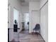 Bright hallway with wood-look flooring and lots of natural light at 1933 Estancia Cir, Kissimmee, FL 34741