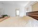 This bedroom features a light-colored quilt, bright window, and open entry to the en-suite bathroom at 1933 Estancia Cir, Kissimmee, FL 34741