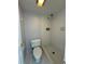 A full bathroom showing the shower and toilet with tiled walls at 200 Maitland Ave # 80, Altamonte Springs, FL 32701
