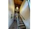 A bright stairwell with wood ceilings and updated vinyl flooring at 200 Maitland Ave # 80, Altamonte Springs, FL 32701