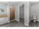 Bathroom featuring a tub, shower, toilet and walk-in closet at 2040 Patriot Way, St Cloud, FL 34769