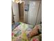 Cozy bedroom with floral bedding, double closets, and a bright window at 2206 Hunters Greene Dr, Lakeland, FL 33810