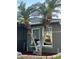 Lovely front exterior features palm trees, a water fountain, and manicured landscaping at 2206 Hunters Greene Dr, Lakeland, FL 33810