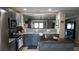 Modern kitchen with gray cabinets, stainless steel appliances, and a stylish island at 2206 Hunters Greene Dr, Lakeland, FL 33810