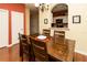 Dining area with modern chandelier situated next to the kitchen, perfect for entertaining at 2301 Butterfly Palm Way # 303, Kissimmee, FL 34747