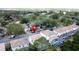 Aerial view of a residential area, highlighting houses, landscaping, and community features for a comprehensive overview at 2408 Saint Augustine Blvd, Haines City, FL 33844
