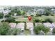 Real estate with tile roof and golf course view near single Gathering homes nestled in lush greenery in a desirable location at 2408 Saint Augustine Blvd, Haines City, FL 33844