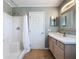 Clean bathroom featuring a shower-tub combination and a vanity with ample counter space at 2408 Saint Augustine Blvd, Haines City, FL 33844